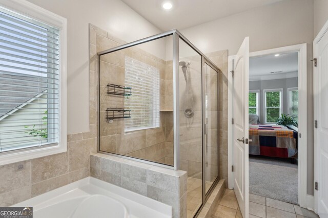 full bath with a stall shower, ensuite bathroom, tile patterned floors, a garden tub, and recessed lighting