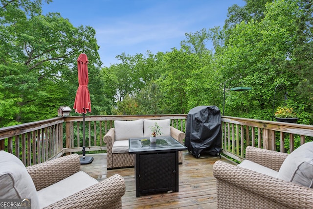 wooden terrace with outdoor lounge area