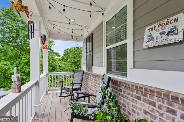 wooden deck with a porch