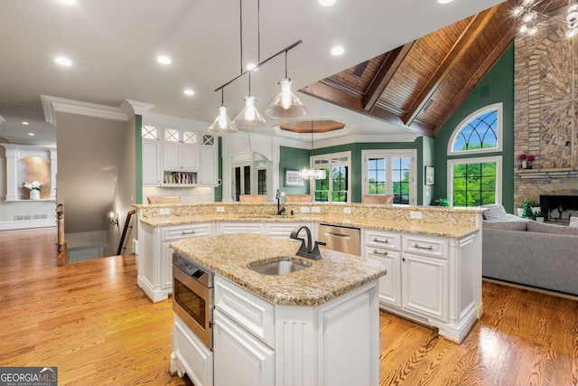 2855 Drayton Hall Dr, Buford, GA 30519 - kitchen with a sink, stainless steel appliances, a large island, a fireplace, and open floor plan