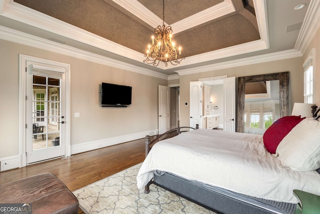 2855 Drayton Hall Dr, Buford, GA 30519 - bedroom with a raised ceiling, crown molding, and wood finished floors