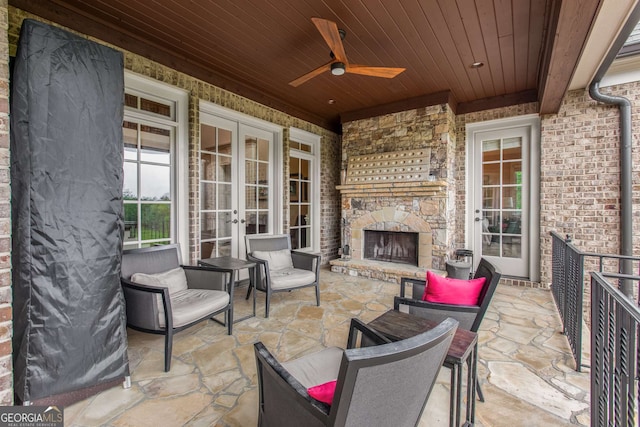 2855 Drayton Hall Dr, Buford, GA 30519 - view of patio / terrace featuring an outdoor stone fireplace, french doors, and ceiling fan