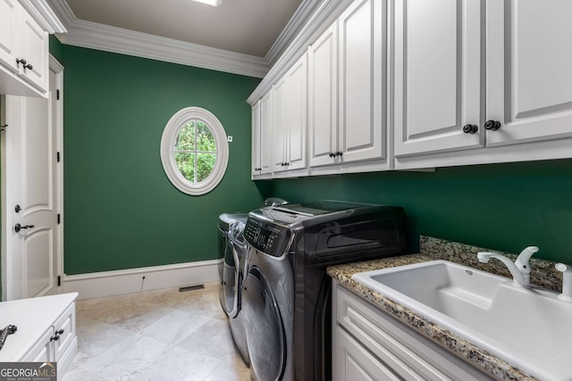 2855 Drayton Hall Dr, Buford, GA 30519 - laundry room featuring a sink, cabinet space, ornamental molding, washing machine and clothes dryer, and baseboards
