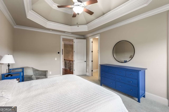 2855 Drayton Hall Dr, Buford, GA 30519 - bedroom featuring light carpet, ornamental molding, a raised ceiling, and baseboards