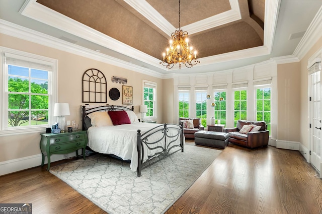 2855 Drayton Hall Dr, Buford, GA 30519 - bedroom with a raised ceiling, a notable chandelier, and crown molding
