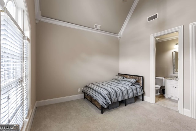 2855 Drayton Hall Dr, Buford, GA 30519 - bedroom featuring light carpet, ornamental molding, visible vents, and high vaulted ceiling