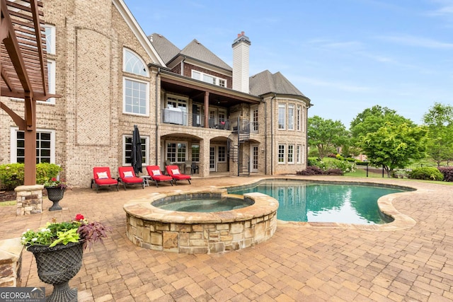 2855 Drayton Hall Dr, Buford, GA 30519 - view of pool featuring a patio area and a pool with connected hot tub
