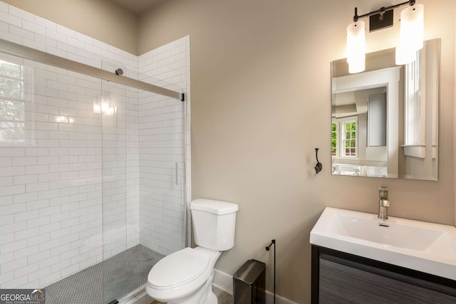 2855 Drayton Hall Dr, Buford, GA 30519 - bathroom featuring vanity, toilet, and a shower stall