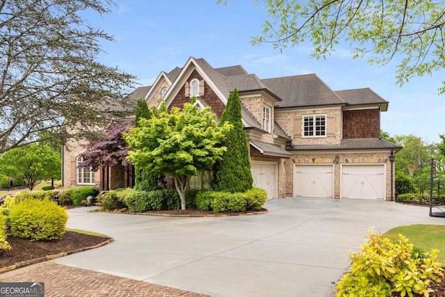 2855 Drayton Hall Dr, Buford, GA 30519 - view of front of home featuring concrete driveway, a shingled roof, and a garage