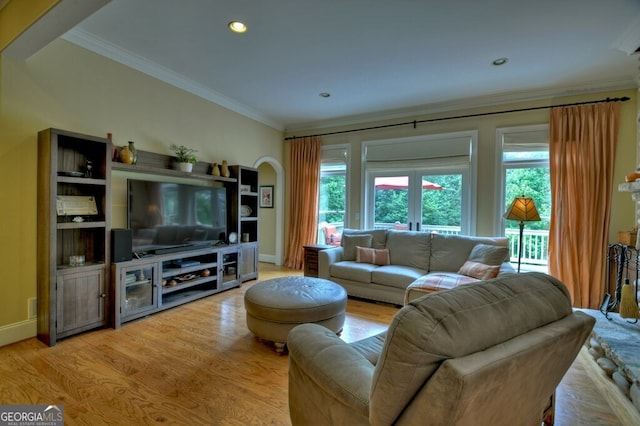 living area with crown molding, recessed lighting, baseboards, and light wood-style floors