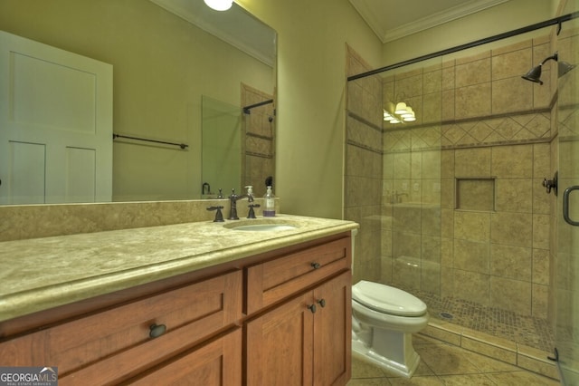 bathroom with crown molding, a stall shower, toilet, and vanity