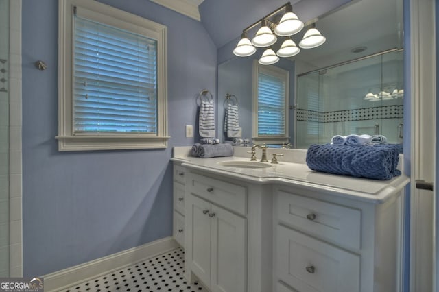 bathroom featuring an inviting chandelier, baseboards, vanity, and tiled shower