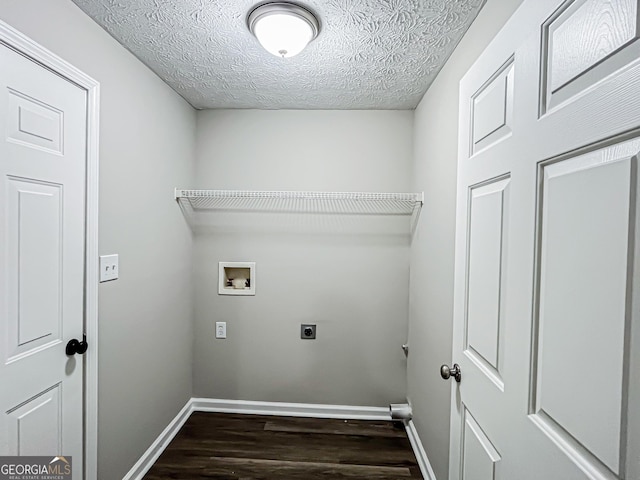 laundry room with laundry area, dark wood-style flooring, baseboards, electric dryer hookup, and washer hookup