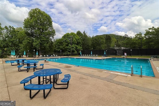 334 Little Pine Mountain Rd, Jasper, GA 30143 - pool featuring a patio area and fence