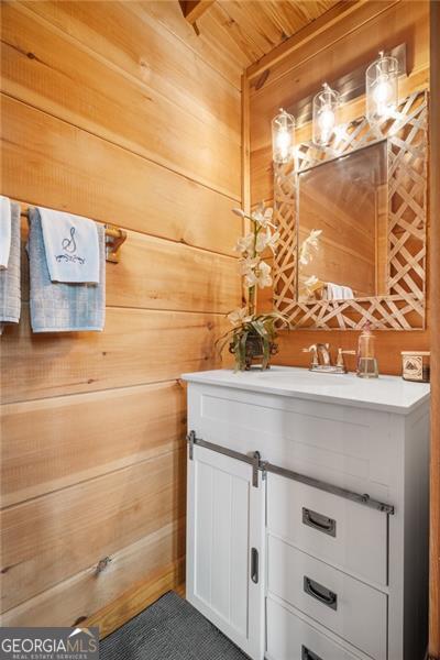 334 Little Pine Mountain Rd, Jasper, GA 30143 - bathroom with vanity, wooden walls, and wooden ceiling
