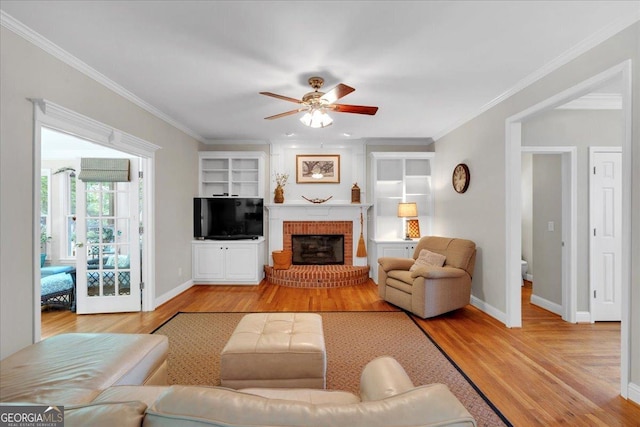 6034 Addington Dr NW, Acworth, GA 30101 - living area with a ceiling fan, baseboards, ornamental molding, and light wood-style floors