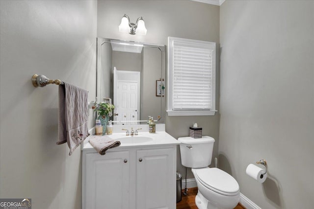 6034 Addington Dr NW, Acworth, GA 30101 - bathroom featuring toilet, baseboards, and vanity