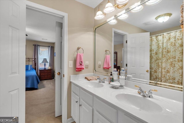 6034 Addington Dr NW, Acworth, GA 30101 - bathroom featuring connected bathroom, double vanity, and a sink