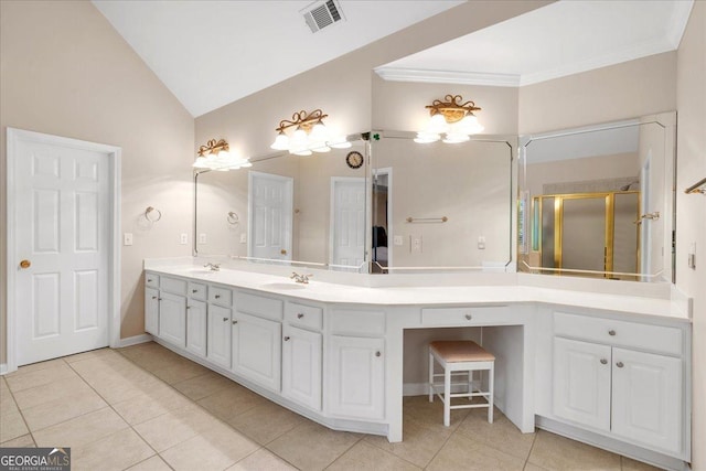 6034 Addington Dr NW, Acworth, GA 30101 - full bath featuring visible vents, a sink, tile patterned floors, and vaulted ceiling