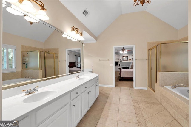 6034 Addington Dr NW, Acworth, GA 30101 - ensuite bathroom with vaulted ceiling, a sink, visible vents, and ensuite bath