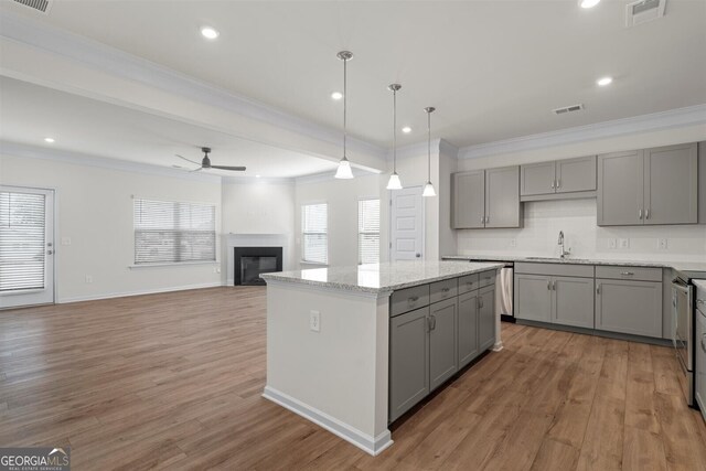 kitchen with gray cabinetry and visible vents