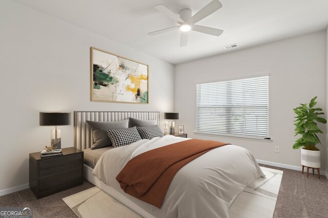 bedroom with baseboards, ceiling fan, carpet flooring, and visible vents