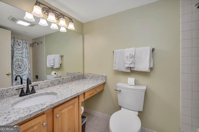 full bath with tile patterned flooring, vanity, toilet, a shower with curtain, and visible vents