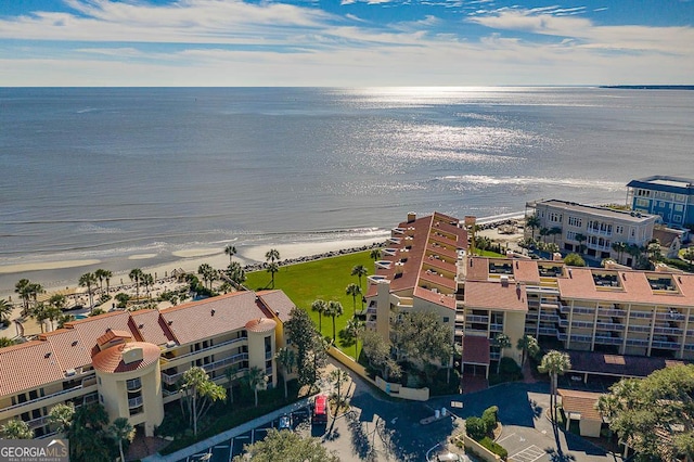 aerial view featuring a water view and a beach view