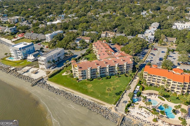 birds eye view of property featuring a water view