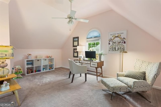 office featuring vaulted ceiling, carpet floors, a ceiling fan, and baseboards