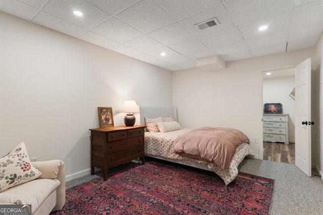 bedroom featuring carpet floors, recessed lighting, and baseboards