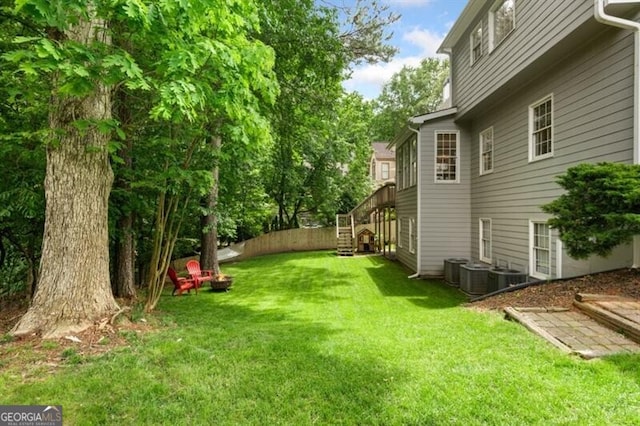 view of yard featuring stairway