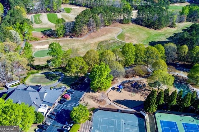 aerial view of property's location featuring a local golf course