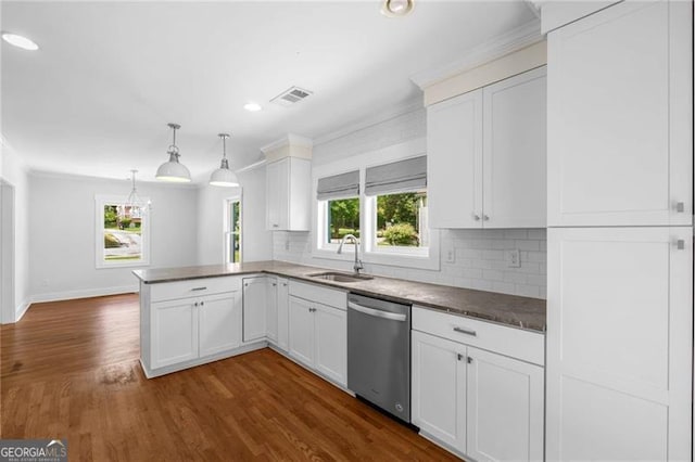 1798 S Gordon St SW, Atlanta, GA 30310 - kitchen featuring a peninsula, a sink, stainless steel dishwasher, and tasteful backsplash