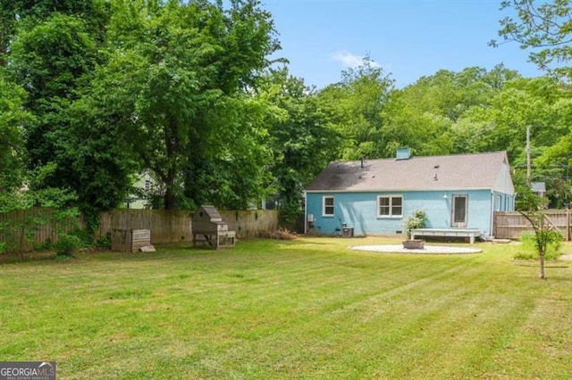 1798 S Gordon St SW, Atlanta, GA 30310 - rear view of property featuring a yard and a fenced backyard