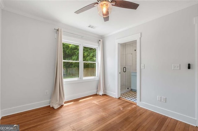 1798 S Gordon St SW, Atlanta, GA 30310 - unfurnished bedroom featuring light wood finished floors, connected bathroom, crown molding, visible vents, and baseboards