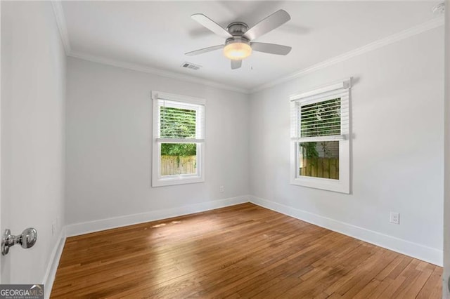1798 S Gordon St SW, Atlanta, GA 30310 - unfurnished room featuring baseboards, ornamental molding, visible vents, and hardwood / wood-style flooring