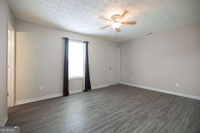 250 Jeremy Dr, Colbert, GA 30628 - empty room with dark wood-style floors, a ceiling fan, and a textured ceiling