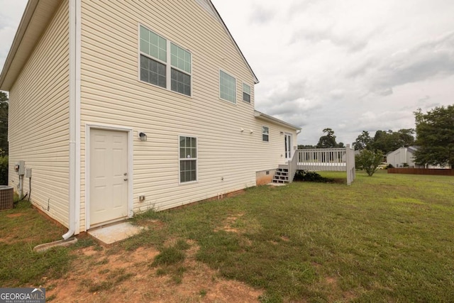 250 Jeremy Dr, Colbert, GA 30628 - rear view of house featuring a wooden deck and a lawn