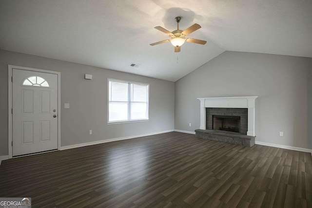 250 Jeremy Dr, Colbert, GA 30628 - unfurnished living room featuring ceiling fan, plenty of natural light, vaulted ceiling, and dark wood-style floors
