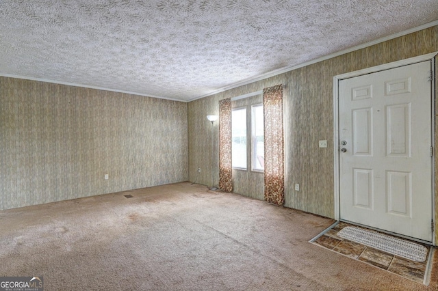 interior space with crown molding and a textured ceiling