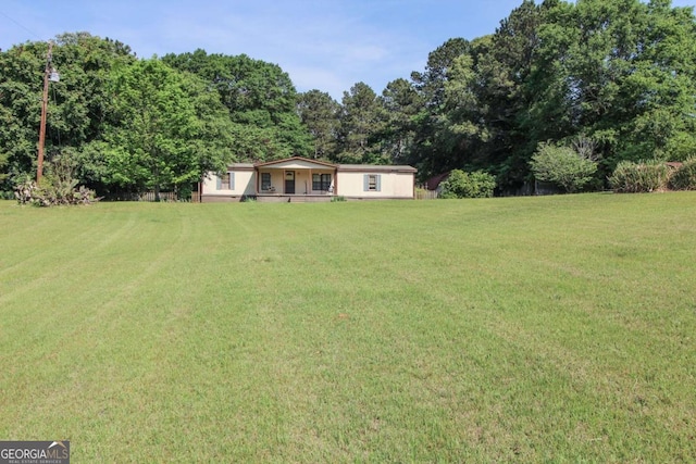 view of yard with a porch