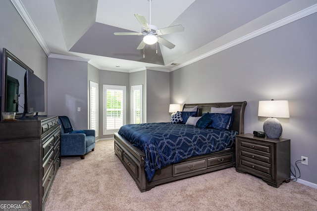 bedroom with light colored carpet, baseboards, and crown molding