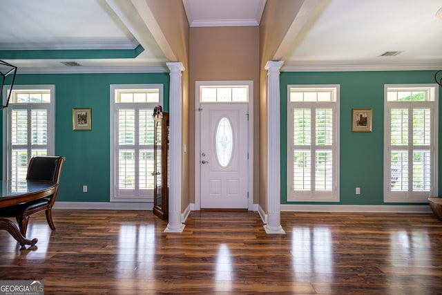 entrance foyer featuring ornate columns, baseboards, and visible vents