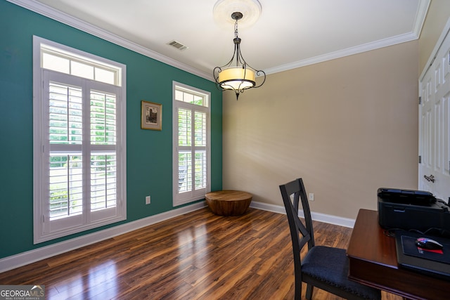 office space featuring baseboards, ornamental molding, wood finished floors, and visible vents