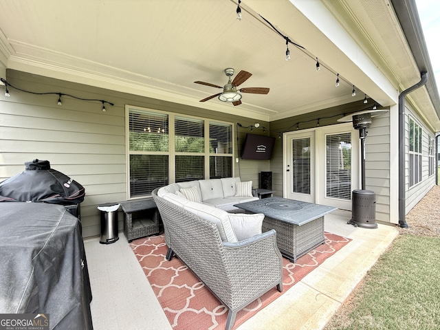 view of patio / terrace featuring a ceiling fan and an outdoor living space