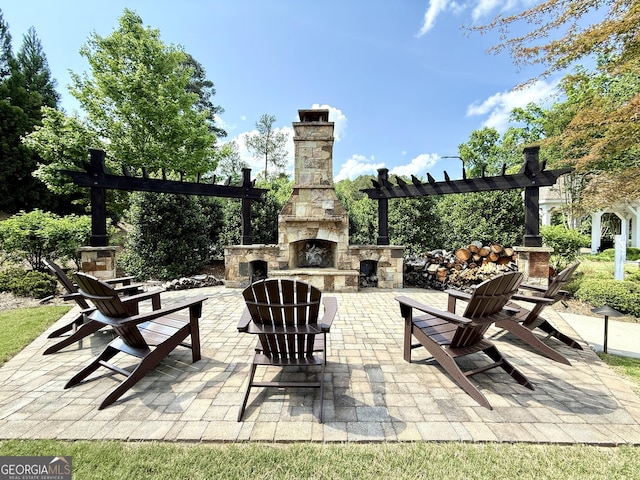 420 Manor Ridge Vw, Alpharetta, GA 30004 - view of patio featuring an outdoor stone fireplace