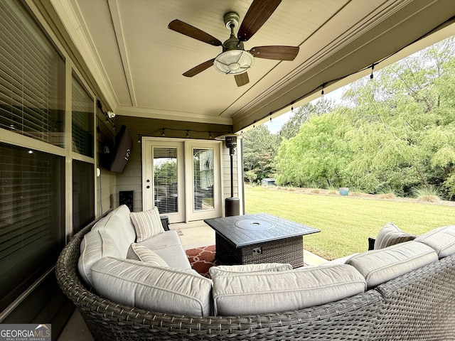 view of patio with ceiling fan and outdoor lounge area