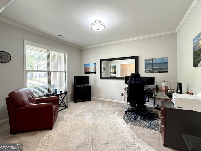 carpeted home office with crown molding, baseboards, and visible vents