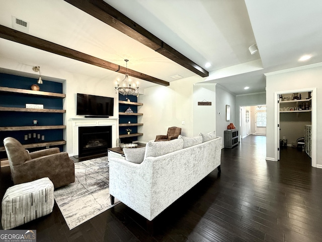 living area with a notable chandelier, a fireplace, dark wood finished floors, baseboards, and visible vents
